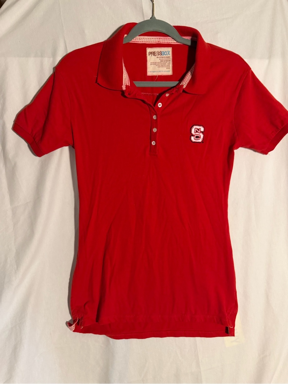 #438 Pressbox Red Women’s Polo with Embroidered NS State Wolfpack on back